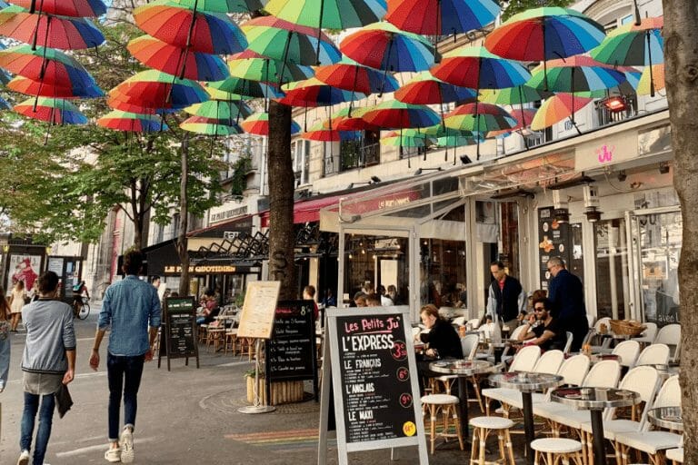 Marais in Paris, rainbow umbrellas in Paris