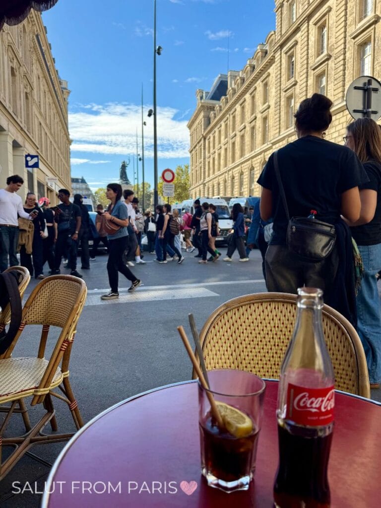 Having a drink just next to the demonstrations